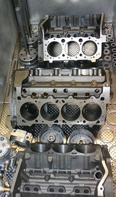V8 and V6 engine blocks inside cryo processing tank, awaiting liquid nitrogen